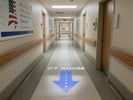 Guiding Patients to CT Rooms: How Projection Devices Transform Wayfinding in U.S. Medical Centers