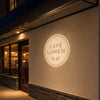 Outdoor Logo Projector for Storefront Signs: Setup, Distance, and Cost